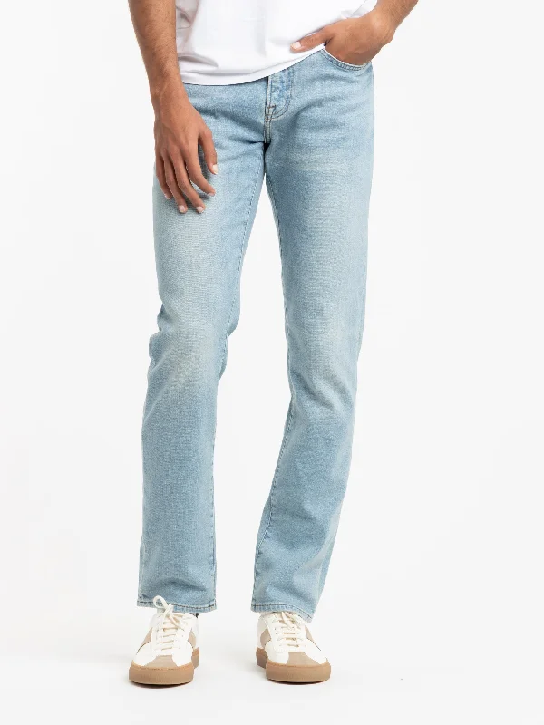 Light Blue L'Homme Slim Finn Jeans